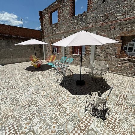 פואבלה Hostal Casa De Arcos מראה חיצוני תמונה